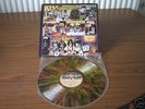 KISS   UNMASKED IN MULTI COLOURED  SPLATTER  VINYL.