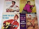 FOURTEEN ELVIS PRESLEY 45 RPM RECORDS & SEVEN SLEEVES