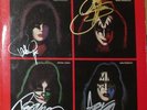 Best Of The Solos Kiss LP Autographed by 4 Gene Simmons