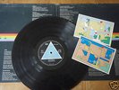 PINK FLOYD.DARK SIDE OF THE MOON. SOLID BLUE TRIANGLE.