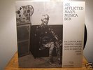 *AN AFFLICTED MAN'S MUSICA BOX.* COIL NURSE WITH WOUND