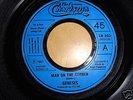 Genesis Man On The Corner UK Juke Box 7 inch Blue Label