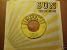 SUN 45RPM OF SLIM RHODES 