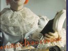 PAGES IMMORTELLES ET BOITES A MUSIQUE DISQUE EN BUFFET