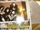 KISS ELECTRIC MAGIC  clear pinkish multicolour wax LP