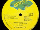 NATURALLY-Sunny Gets Blue-Ottey's 12