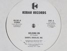 DARRYL DOUGLAS, INC Holding On KEBAR 12