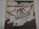 AEROSMITH GET A GRIP RECORD INSERT SIGNED BY THE BAND WITH CONCERT TICKET