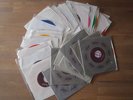 Beatles - Collection of 21 different colored jukebox records MINT