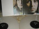 Double Beatles White Album on White Vinyl Includes the 4 photos