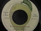 Delano Tucker -build our country + socialist dub 45 Mango All Stars rare reggae