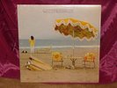 NEIL YOUNG ON THE BEACH LP EXCELLENT WITH SHRINK WRAP AND TEXTURED INSIDE PRINT