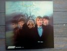 vinyl record rolling stones between the buttons