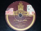 TANGO 78 rpm RECORD Odeon CARLOS GARDEL Tango A LA LUZ DEL CANDIL / ROSAS DE...