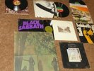 Black Sabbath Master of reality and Led Zeppelin Songs remain the same unopenned