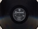 Buddy Holly.  Rock around with Ollie Vee; Midnight shift.  UK Brunswick 05800