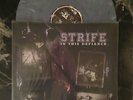 STRIFE in this defiance 12