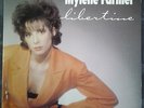 45 tours Mylene Farmer Libertine / Greta Polydor N°883 829-7 1986 Veste Orange