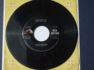 ELVIS PRESLEY 45 SHE'S NOT YOU / JUST TELL HER JIM SAID HELLO RCA 447-0637 DOS