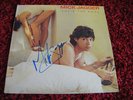Mick Jagger - She's the Boss LP Sleeve signed by Mick Jagger