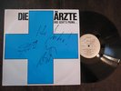 DIE ÄRZTE „UNS GEHT'S PRIMA...“ Blaues Kreuz-originl signiert von Bela u. Farin