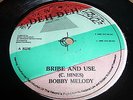 BOBBY MELODY 7'' BRIBE AND USE KILLER ROOTS MINT