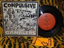 Compulsive Gamblers Bad Taste / Way Down In The Hole 7