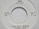 hear: ELECTRIC JUNGLE on Nike M- xmas funk 45 Funky Funky Christmas/Soul Santa