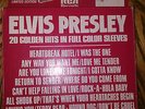 VINTAGE ELVIS PRESLEY: 20 GOLDEN HITS FULL COLOR SLEEVES BOX SET (Vinyl 45's)