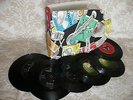 COLLECTION OF 18 ORIGINAL BEATLES SINGLES 1963-1970 IN A 1960s RECORD HOLDER