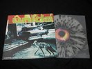 Unida - Coping With The Urban Coyote Splatter Clear Black Vinyl LP