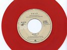 DEVO 'WHIP IT' EL SALVADOR RED VINYL 45