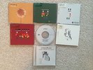 Six Coldplay singles (Talk, Yellow, Fix You, Speed of Sound, Clocks, Bros+Sis)