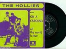 the HOLLIES - On a Carousel / All the World is Love (1967) - EX HOLLAND PS 45