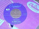 45 RECORD,  DINNING SISTERS.  LOVE ME BLUES  / I DON'T STAND GHOST OF A CHANCE.