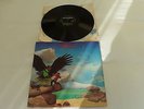 Budgie.  Never turn your back on a friend.  LP.