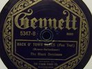 THE BLACK DOMINOES 