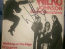 WALKING ON THE EDGE by WILKO JOHNSON'S SOLID SENDERS. SIGNED UK 1st PRESS VINYL.