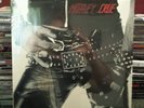Motley crue too fast for love leathur records re-release with 45 single sealed