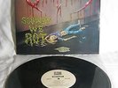 Obituary - Slowly We Rot LP. 12