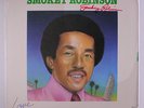 SMOKEY ROBINSON: Love Breeze LP (reissue, Autographed oc, saw mark, some shrink