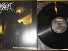 DESASTER LP A TOUCH OF MEDIEVAL DARKNESS  MERCILESS 003