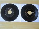 (2) Elvis 45rpm records, That's All Right/Blue Moon of Kentucky Mystery Train,