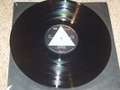 PINK FOYD , DARK SIDE OF THE MOON . SOLID BLUE . LISTEN TO BOTH SIDES .