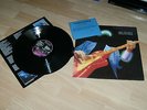 Dire Straits Money For Nothing LP, Signed by Mark Knopfler