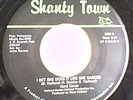 Hard Cover   “I Bet She Does It Like She Dances/Do You care…” (Shanty Town)