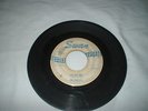 The Beatles on Swan records-white label with blue print-