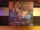 DAVID BOWIE THE MAN WHO SOLD THE WORLD GREEN VINYL LP TEXTURED SLEEVE.