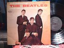 INTRODUCING THE BEATLES rarer black label with oval VEE JAY in silver VG+