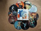 David Bowie Fashions. 10 x 7inch picture disks folder set.